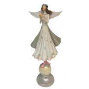 WHITE PINK ANGEL STANDING ON BALL